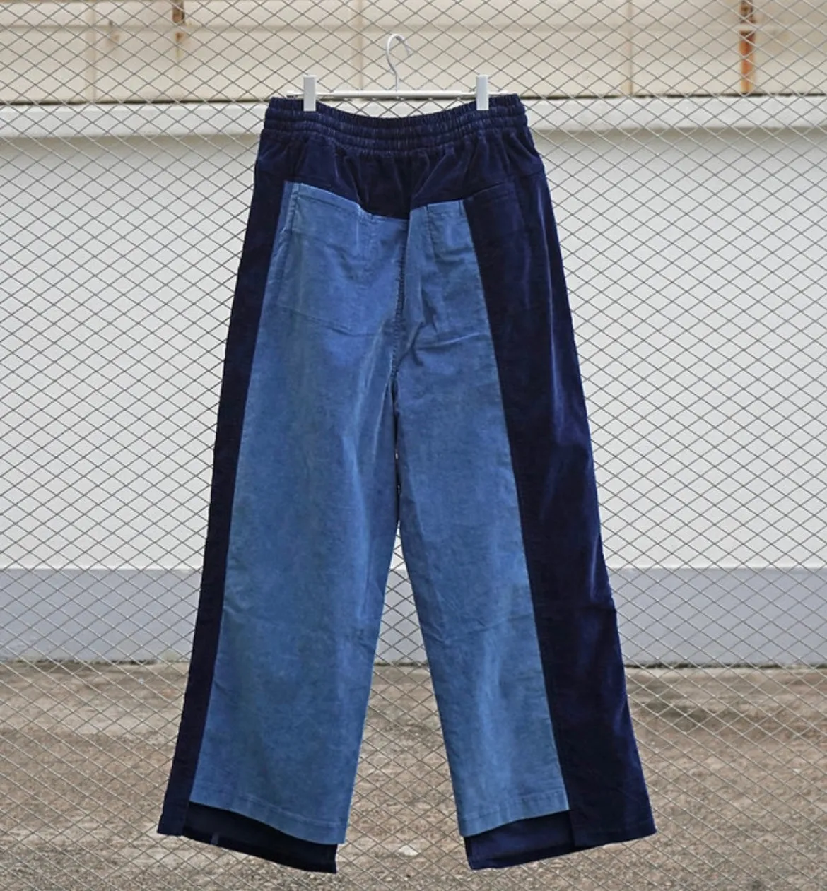 CALLIGRAPHY LASER PRINT DENIM VELVET DECONSTRUCTED TRACK-PANTS