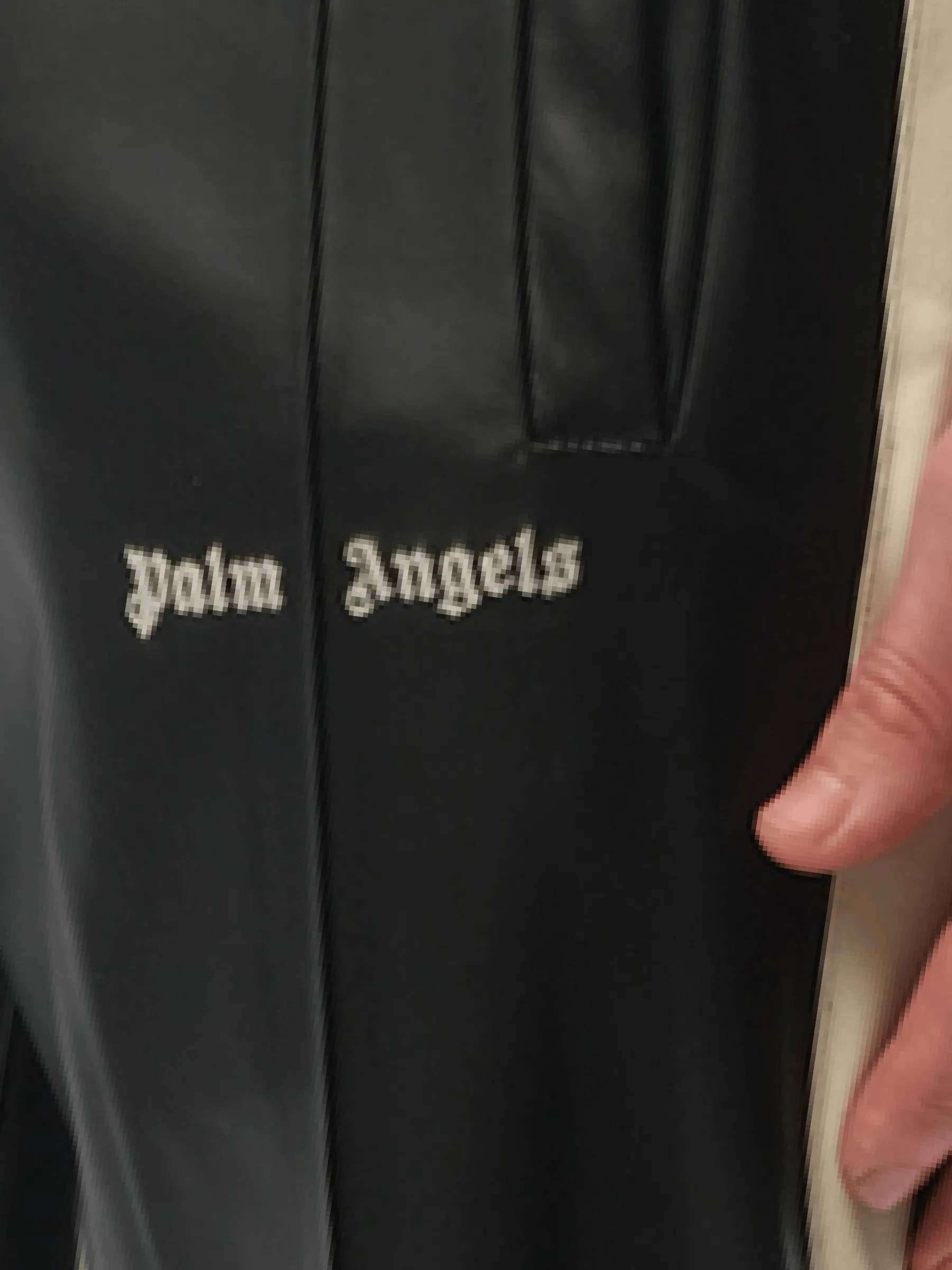 Leather Effect Track Pants in Black/Off White